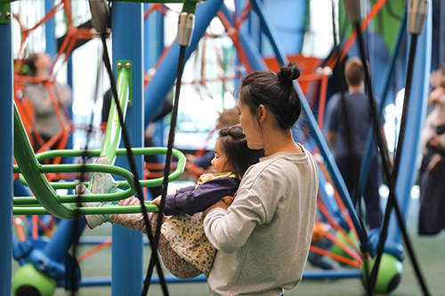 Photo of people playing at an indoor playground