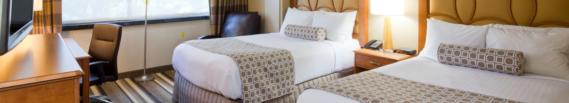 Image of a double bed room at the Crowne Plaza Hotel