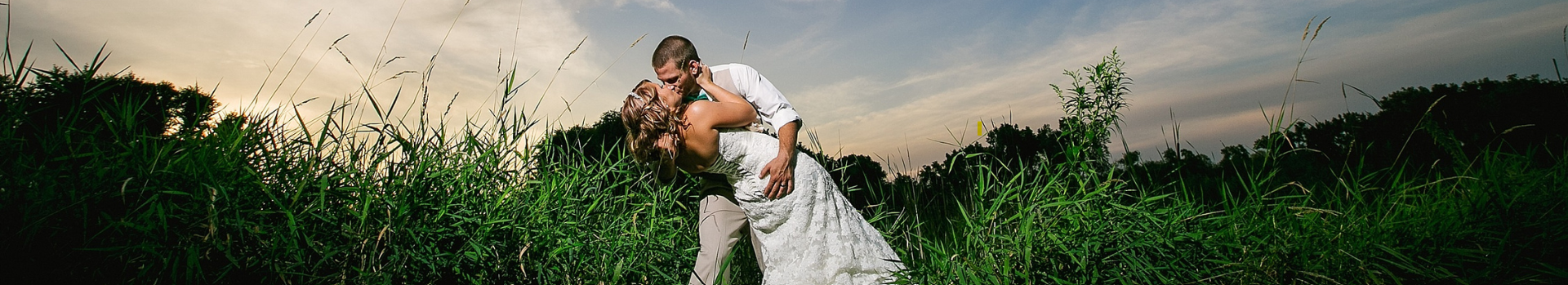 Image of wedding couple kissing